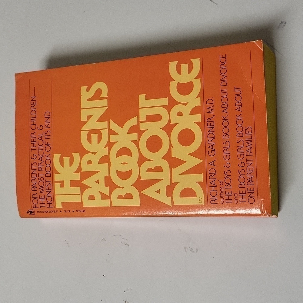 The parents book about divorce: with paper back orange and yellow color 7"x4"